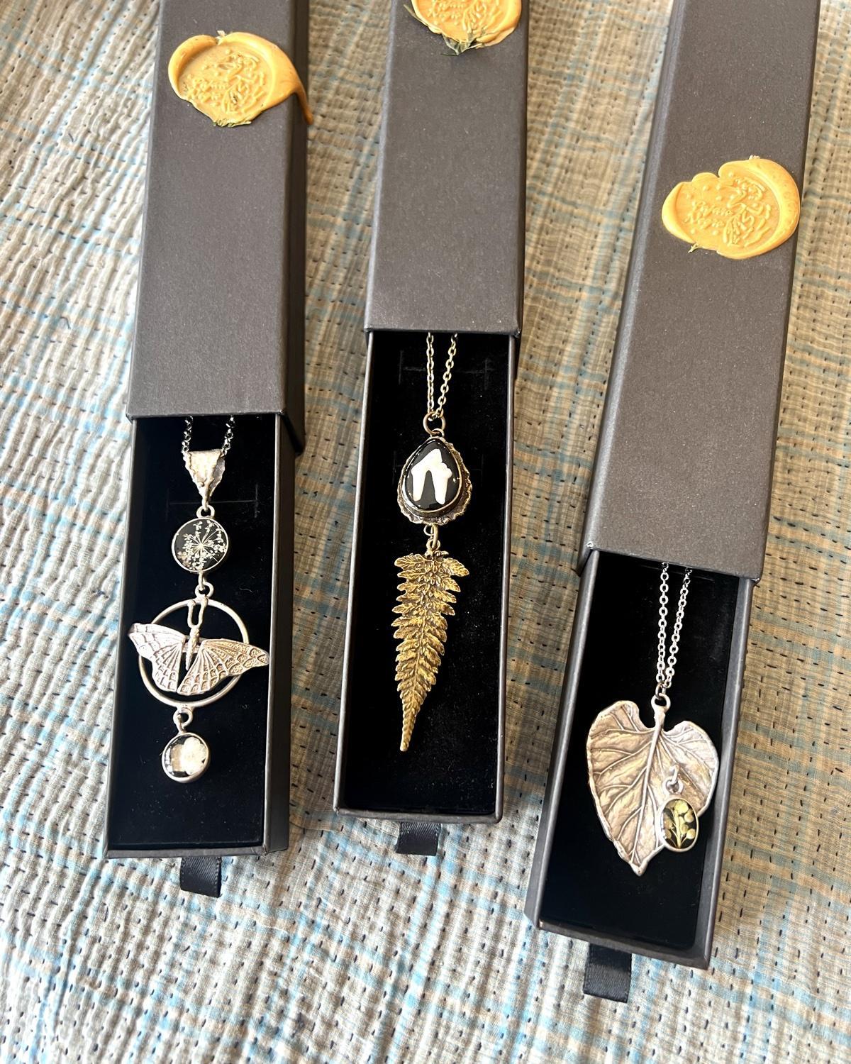 Pajaro Negro Butterfly and Floral Necklace in a Wax Sealed Box