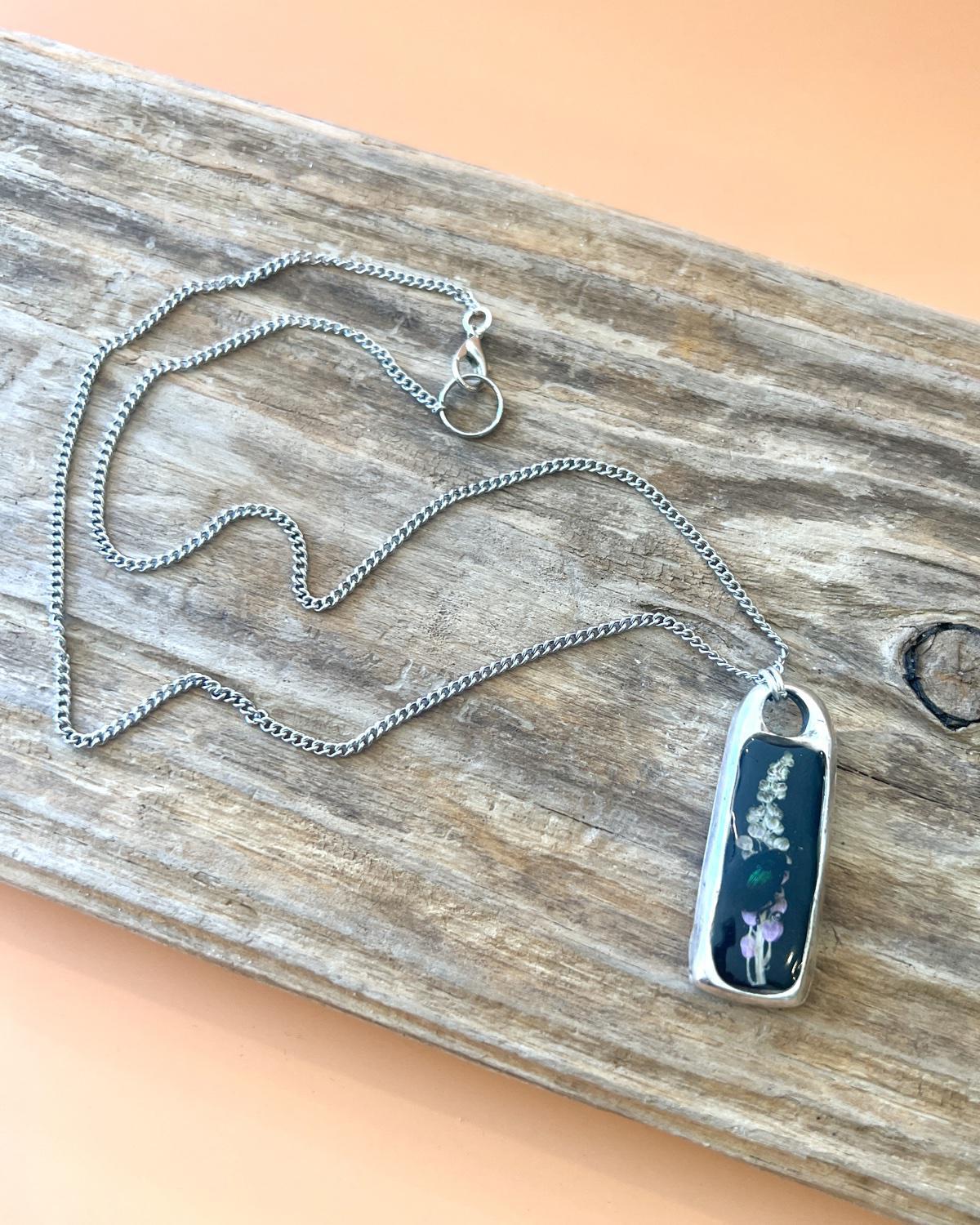 Pajaro Negro Long Silver Rectangle Beetle and Flora Pendant Necklace