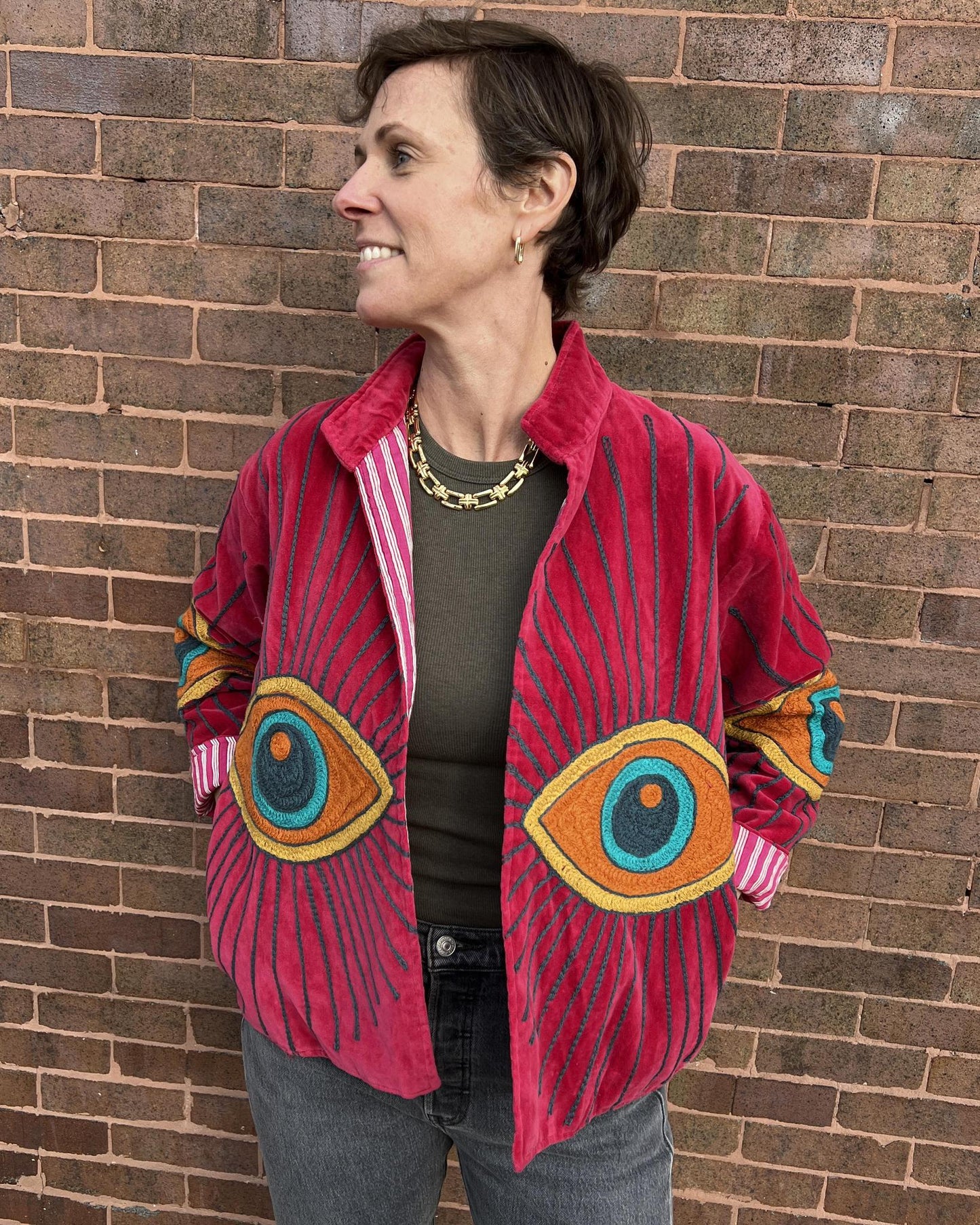 Txtile Velvet Evil Eye Jacket in Magenta with Orange Eyes