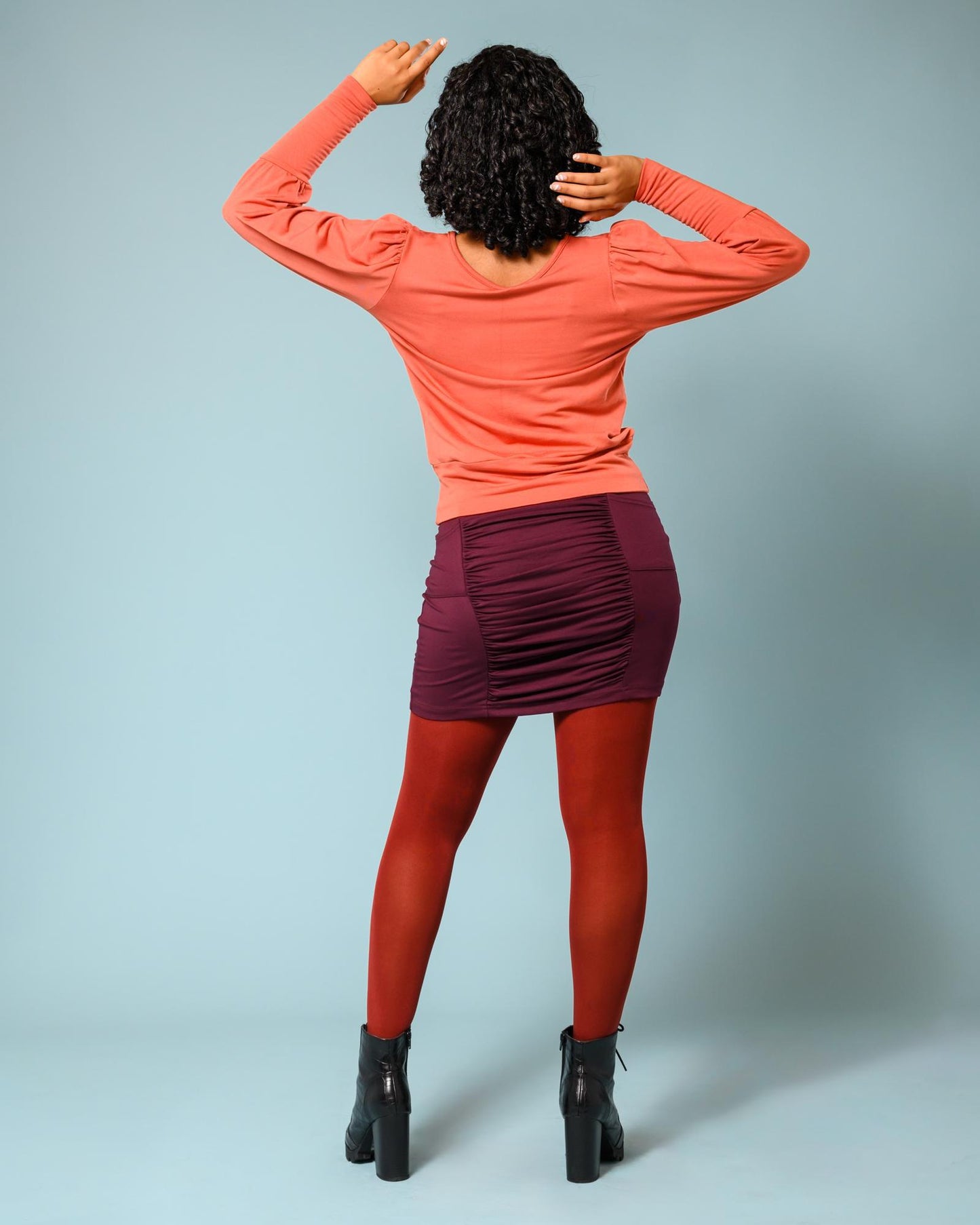 Squasht Ruched Mini Skirt in Merlot