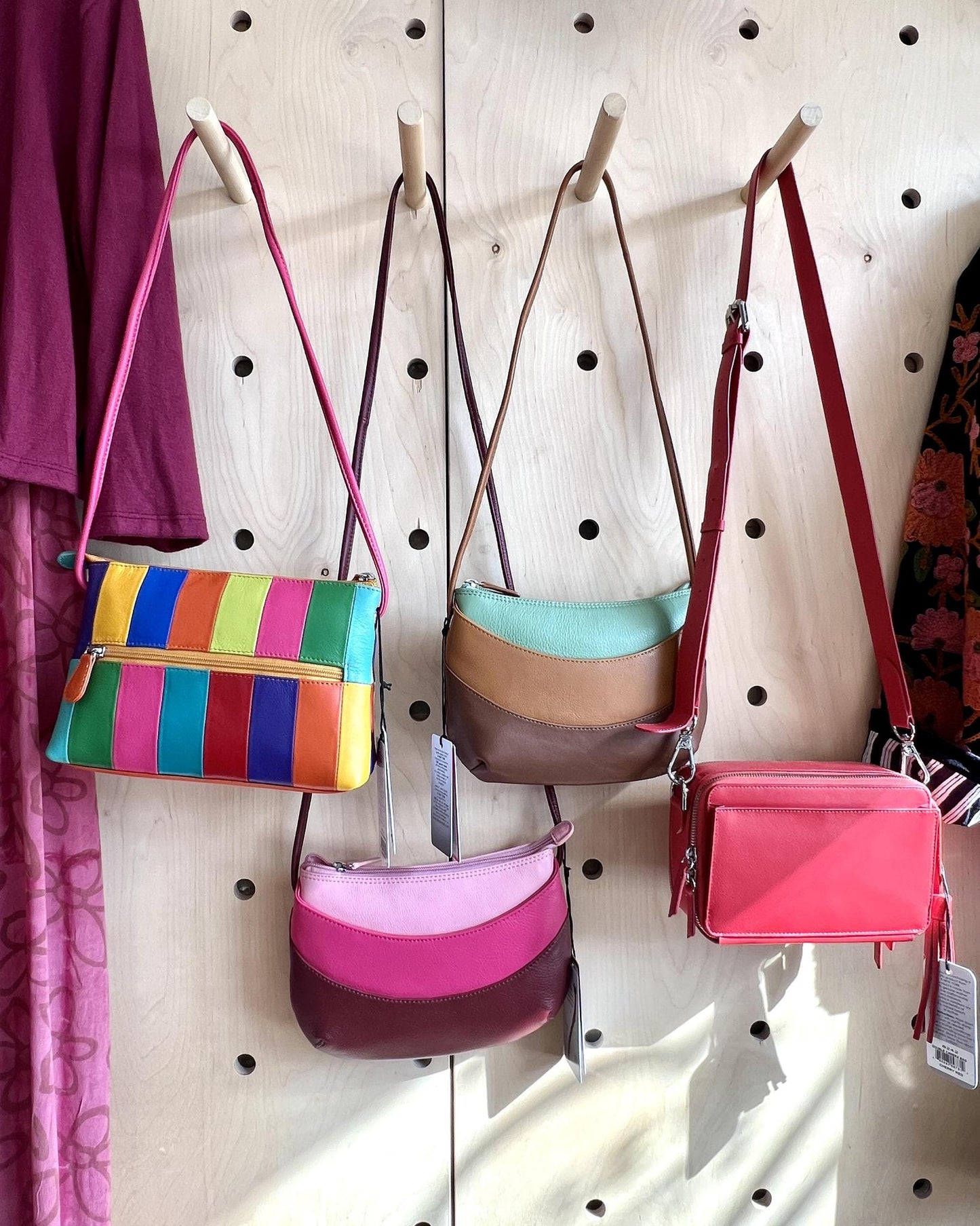 ili Leather Round Zip Top Crossbody in Shades of Pink