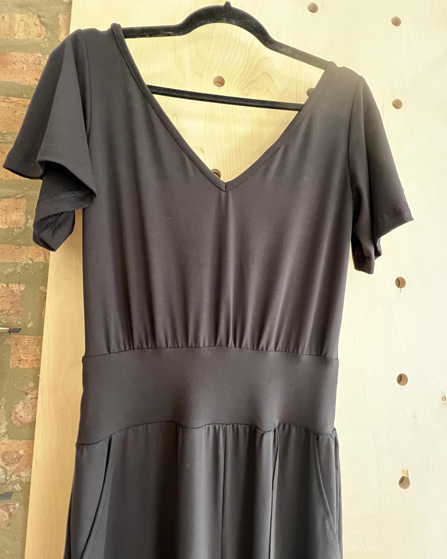 Squasht Jumpsuit with Bell Sleeves in Solid Black