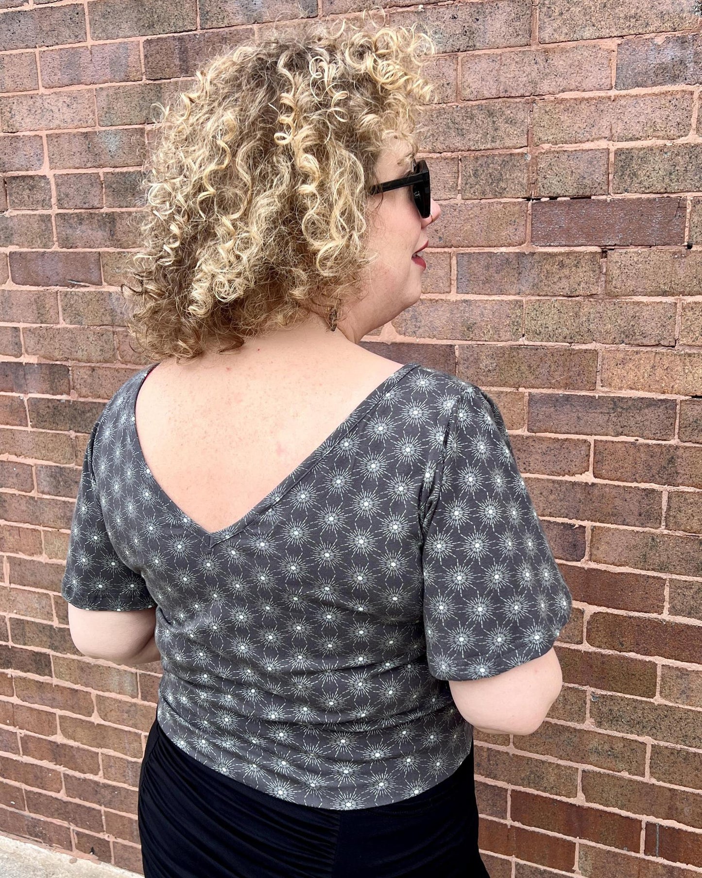 Squasht Bell Sleeve Ballet Top in Gray Starburst Print