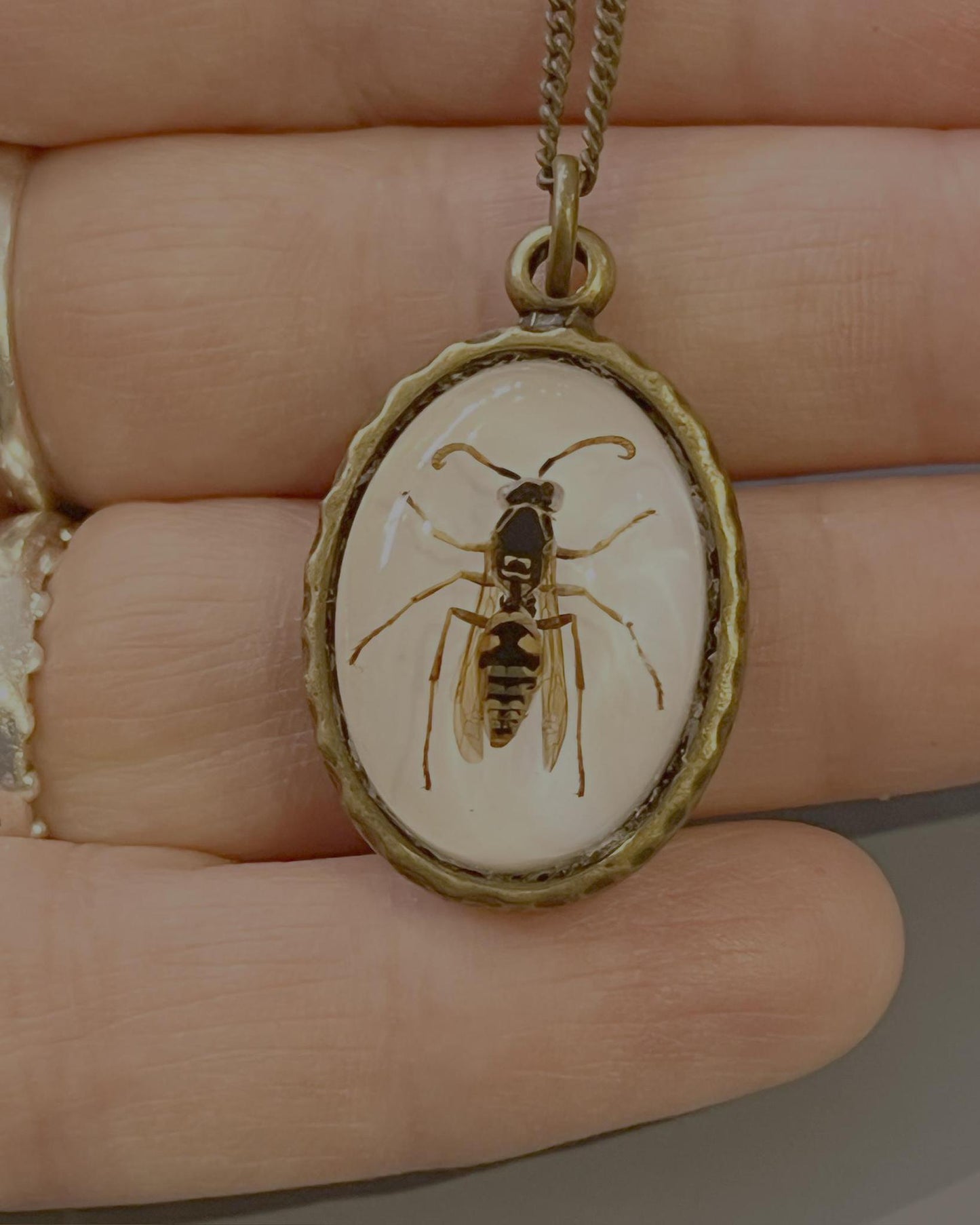 Pajaro Negro Large Brass Oval Hornet Pendant Necklace