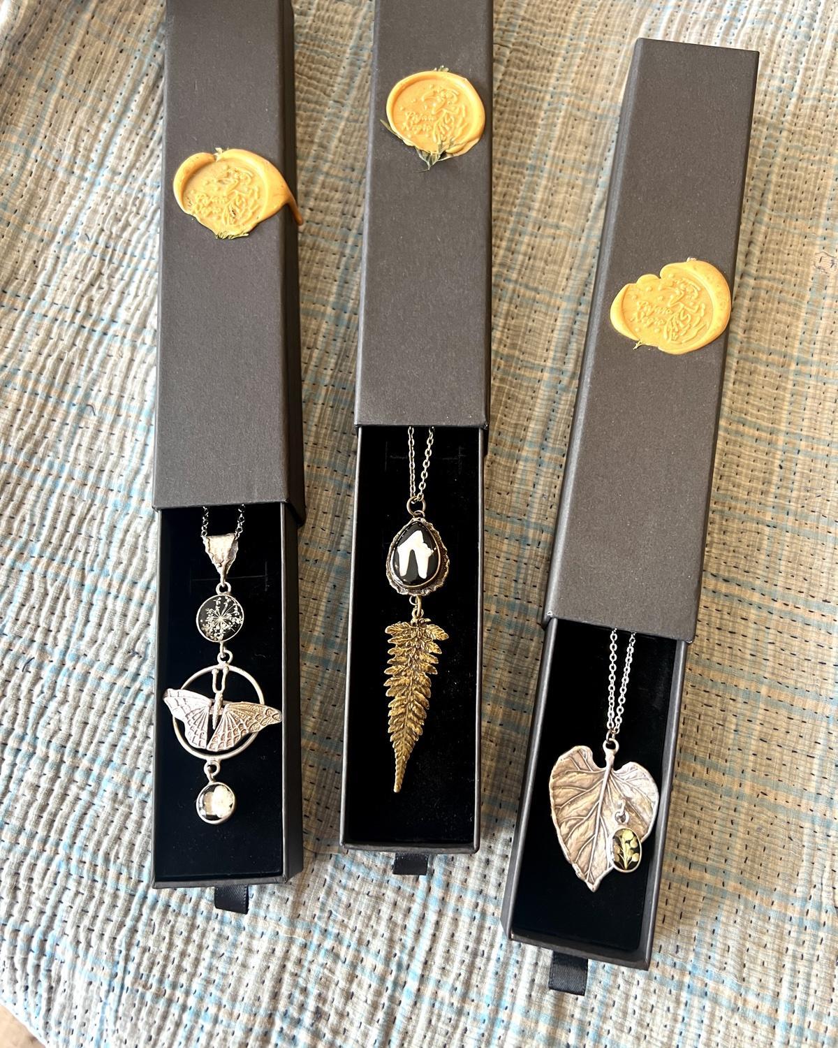 Pajaro Negro Butterfly and Floral Necklace in a Wax Sealed Box