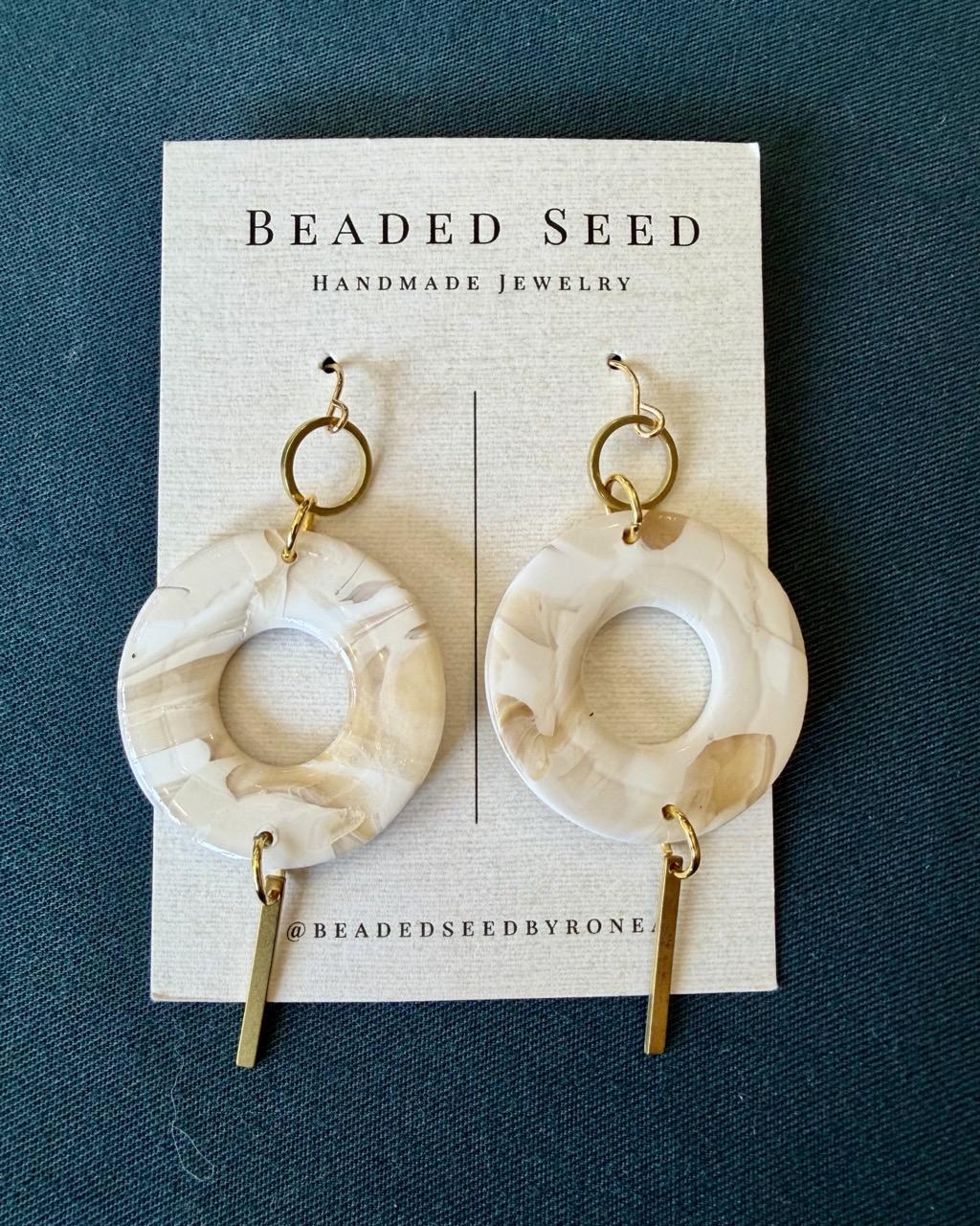 Beaded Seed by Ronea Dangle Earrings in Marbled White