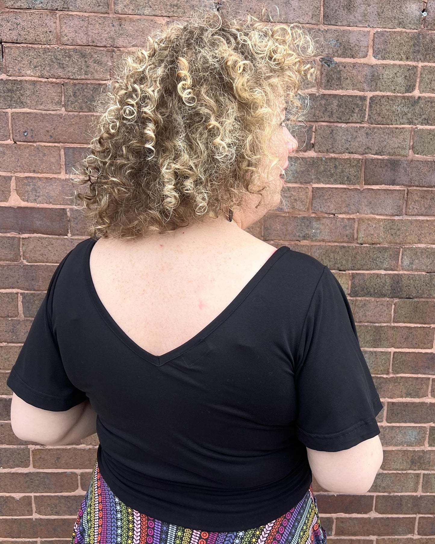 Squasht Bell Sleeve Ballet Top in Black