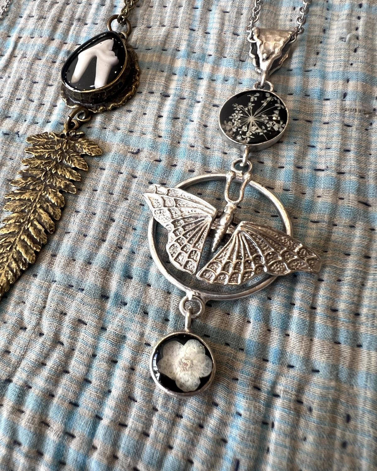 Pajaro Negro Butterfly and Floral Necklace in a Wax Sealed Box