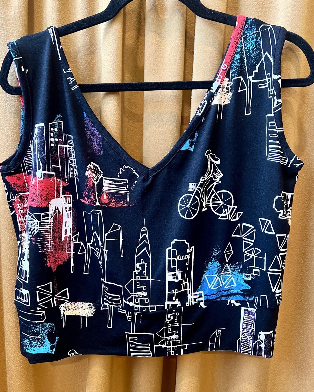 Squasht Sleeveless Ballet Top in Black with City Girl, Bike, and Dog Print