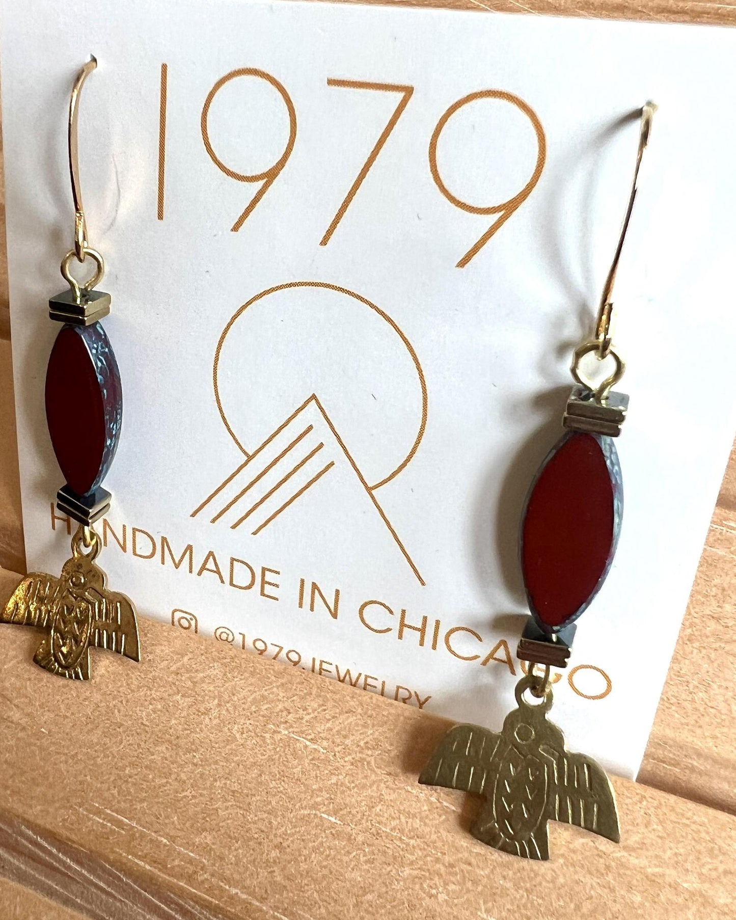 1979 Jewelry Brass Earrings Rust Ovals with Brass Thunderbirds
