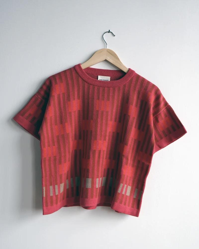 The Endery Bauhaus Short Sleeve Sweater Tee in Aurora (Red/Orange)