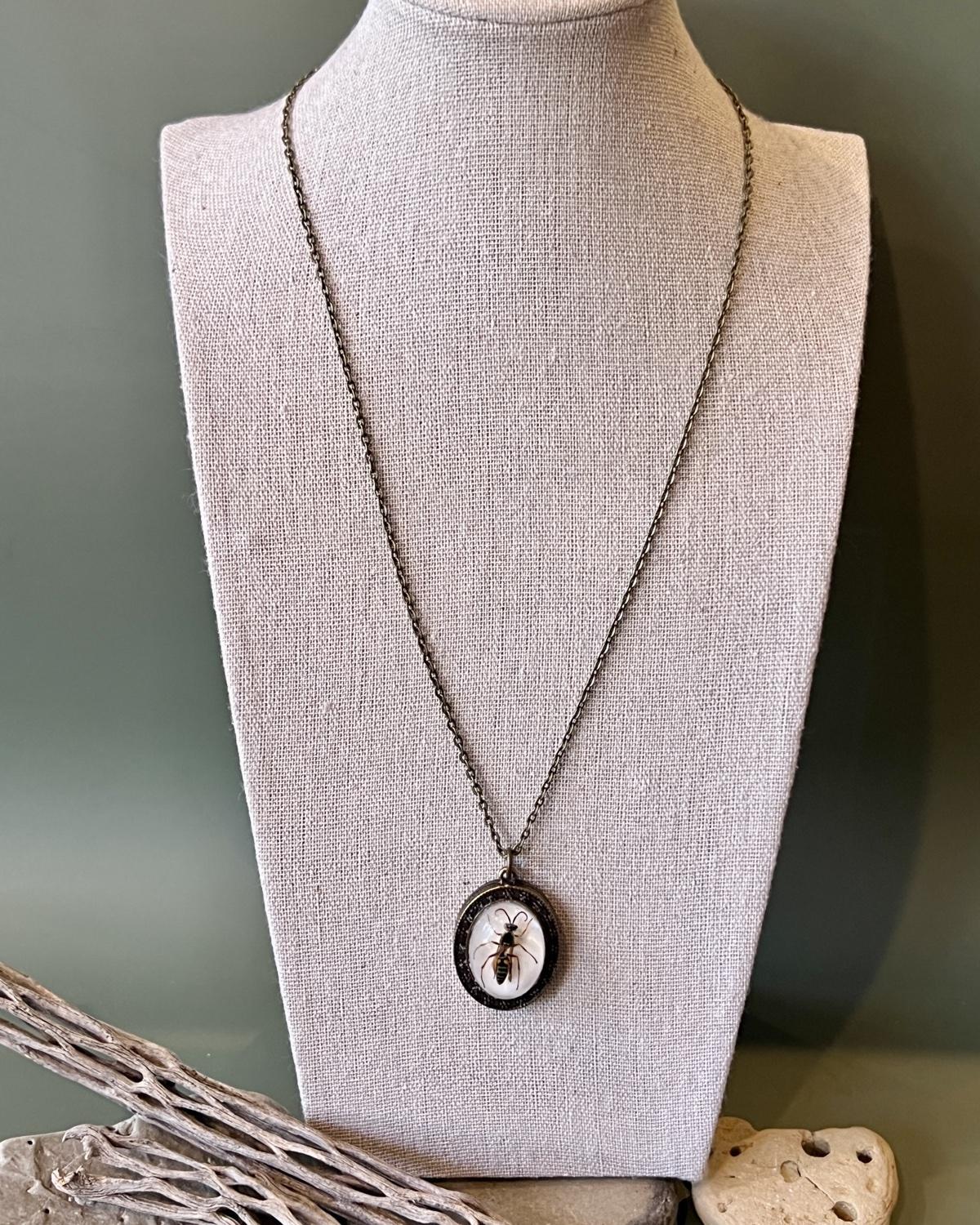 Pajaro Negro Hornet Oval Pendant Necklace