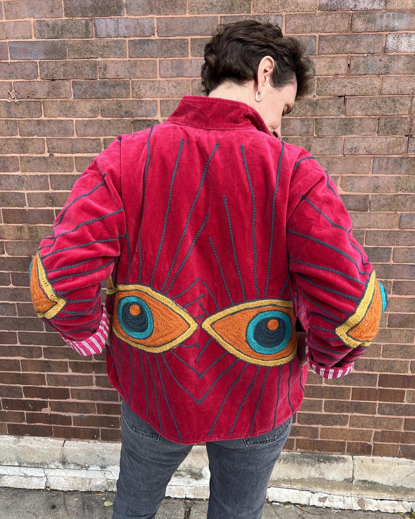 Txtile Velvet Evil Eye Jacket in Magenta with Orange Eyes