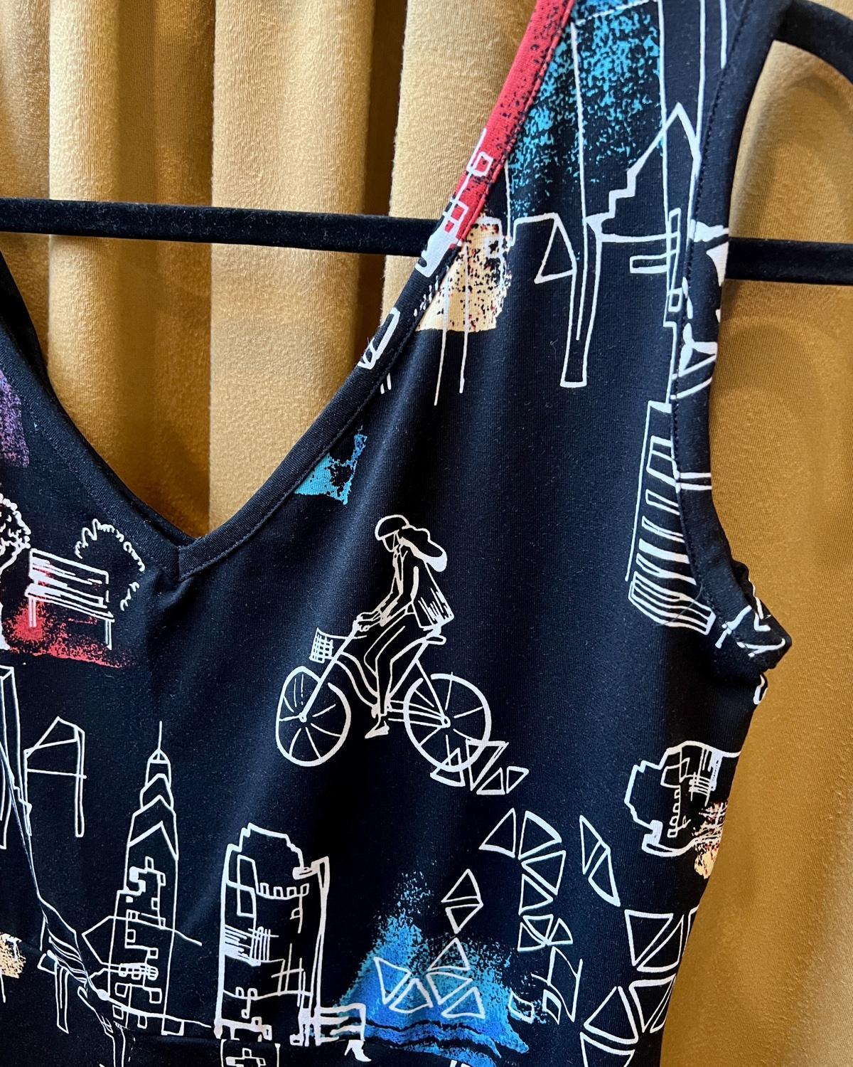 Squasht Sleeveless Ballet Top in Black with City Girl, Bike, and Dog Print