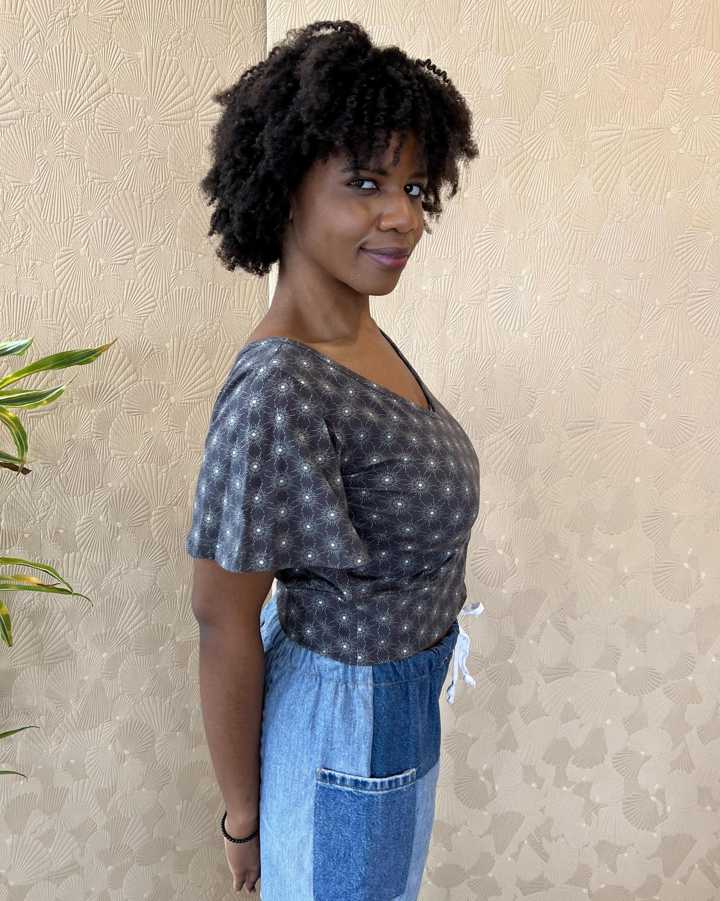 Squasht Bell Sleeve Ballet Top in Gray Starburst Print