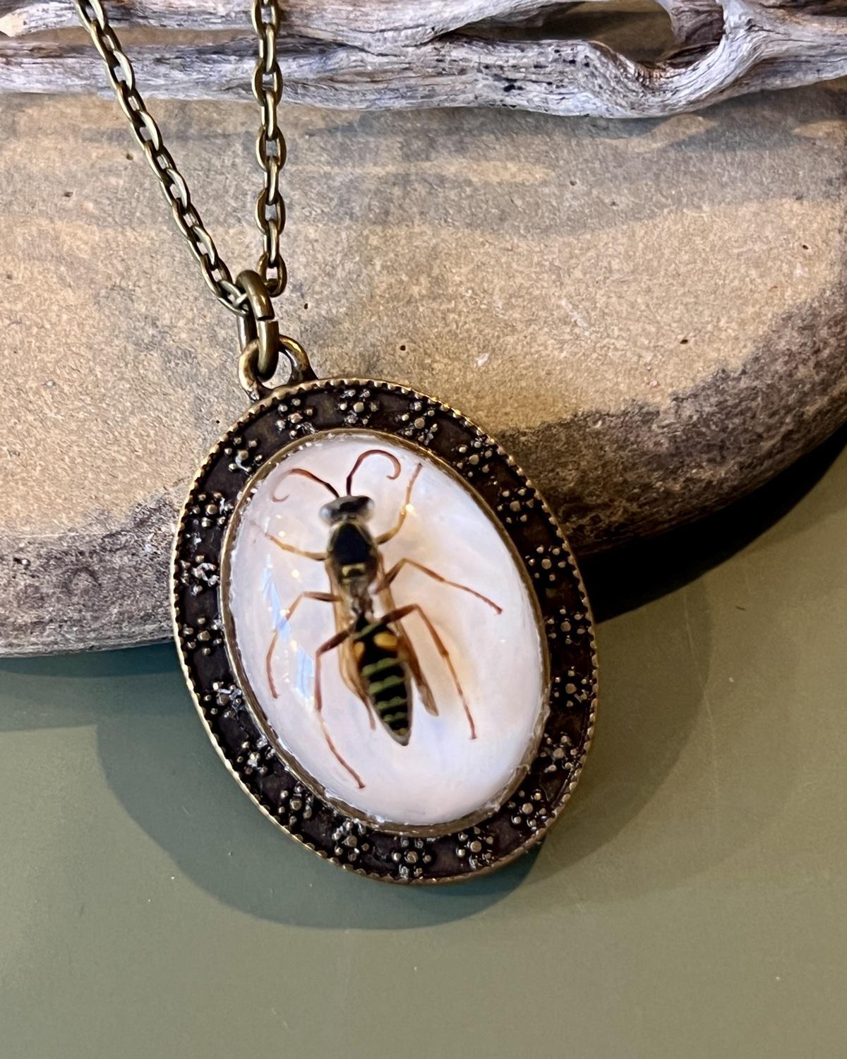 Pajaro Negro Hornet Oval Pendant Necklace