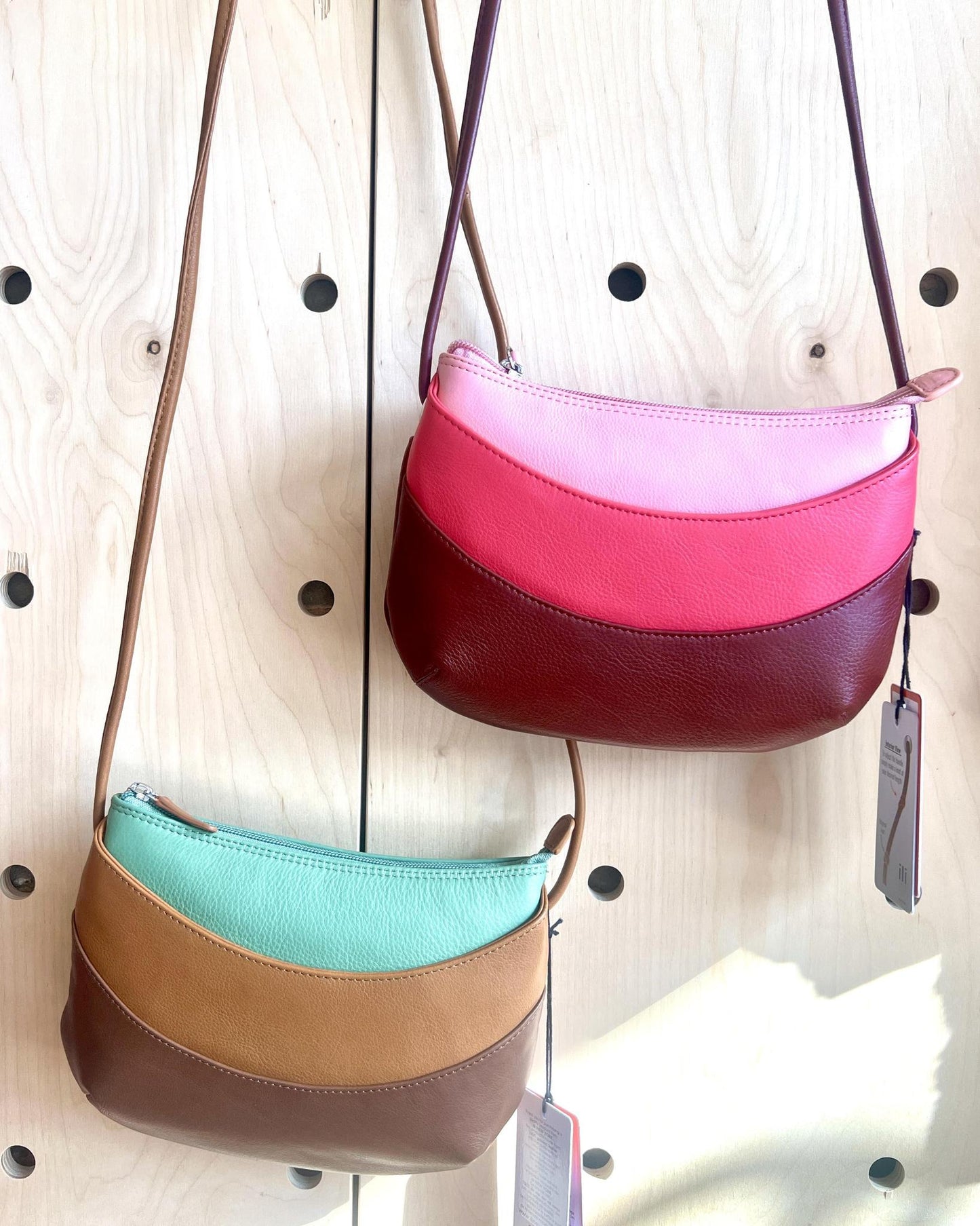 ili Leather Round Zip Top Crossbody in Shades of Pink