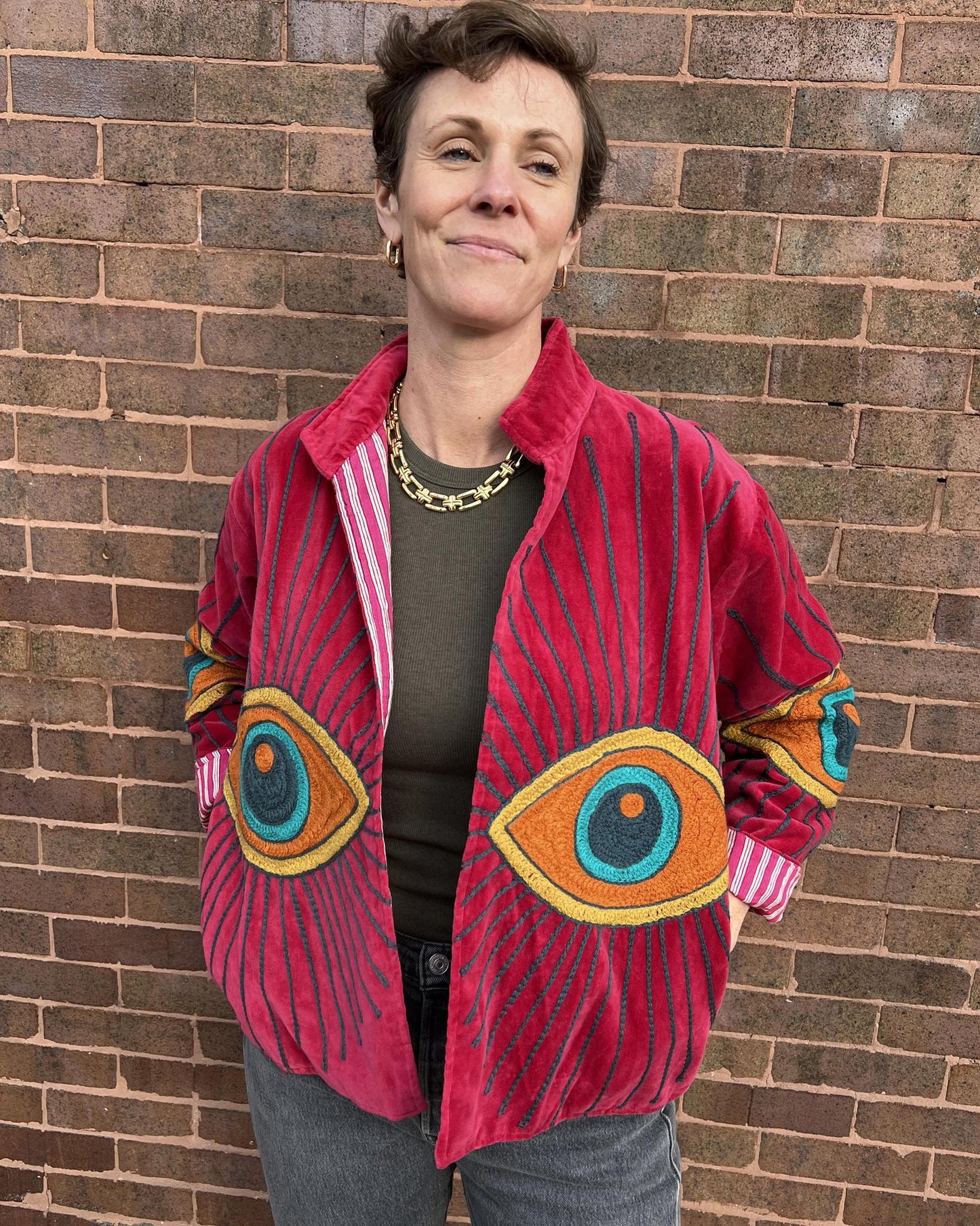 Txtile Velvet Evil Eye Jacket in Magenta with Orange Eyes