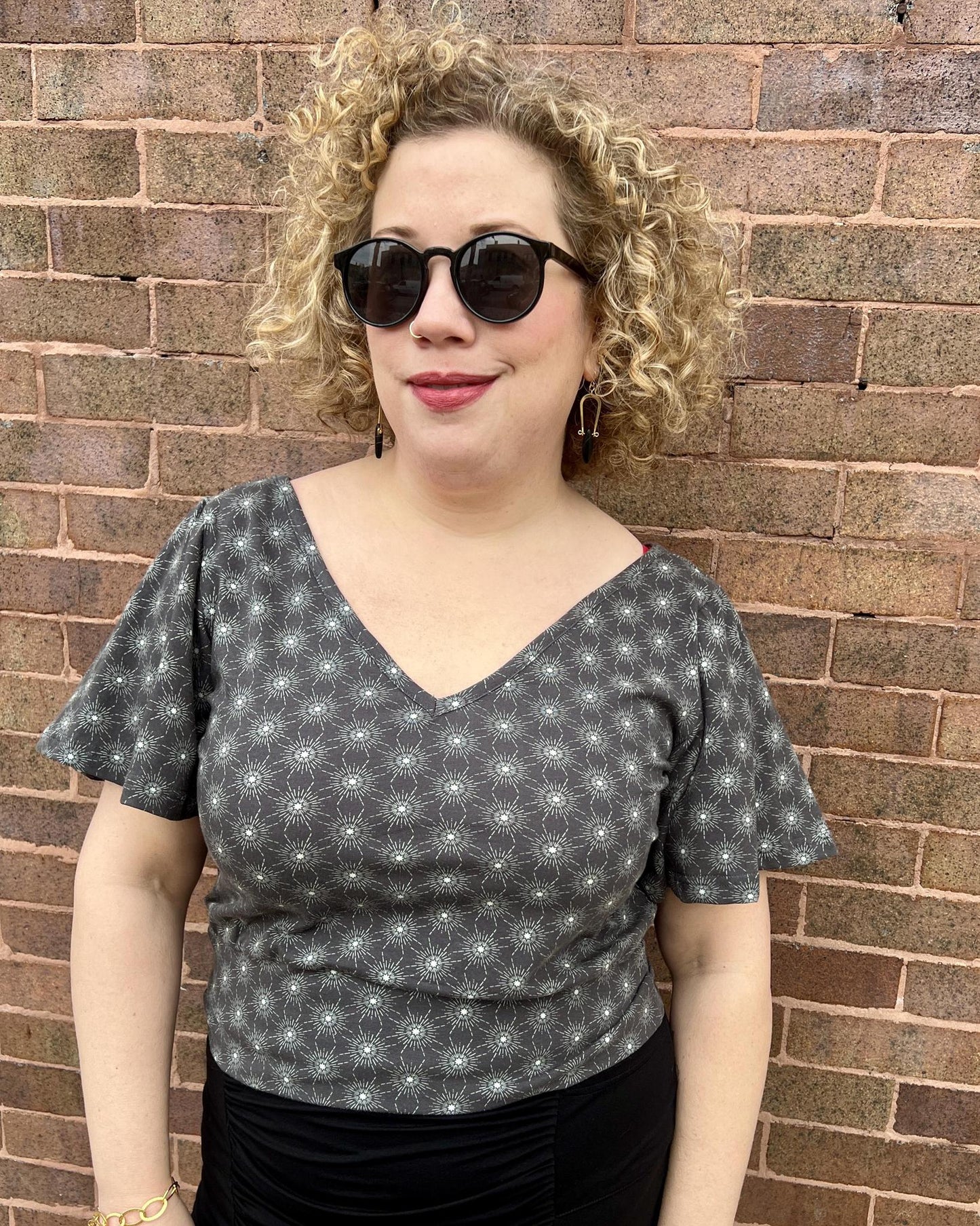 Squasht Bell Sleeve Ballet Top in Gray Starburst Print