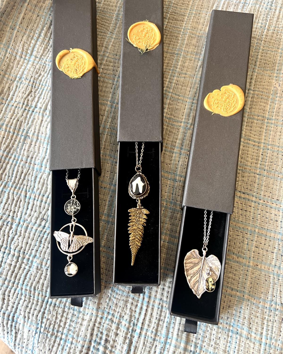 Pajaro Negro Butterfly and Floral Necklace in a Wax Sealed Box