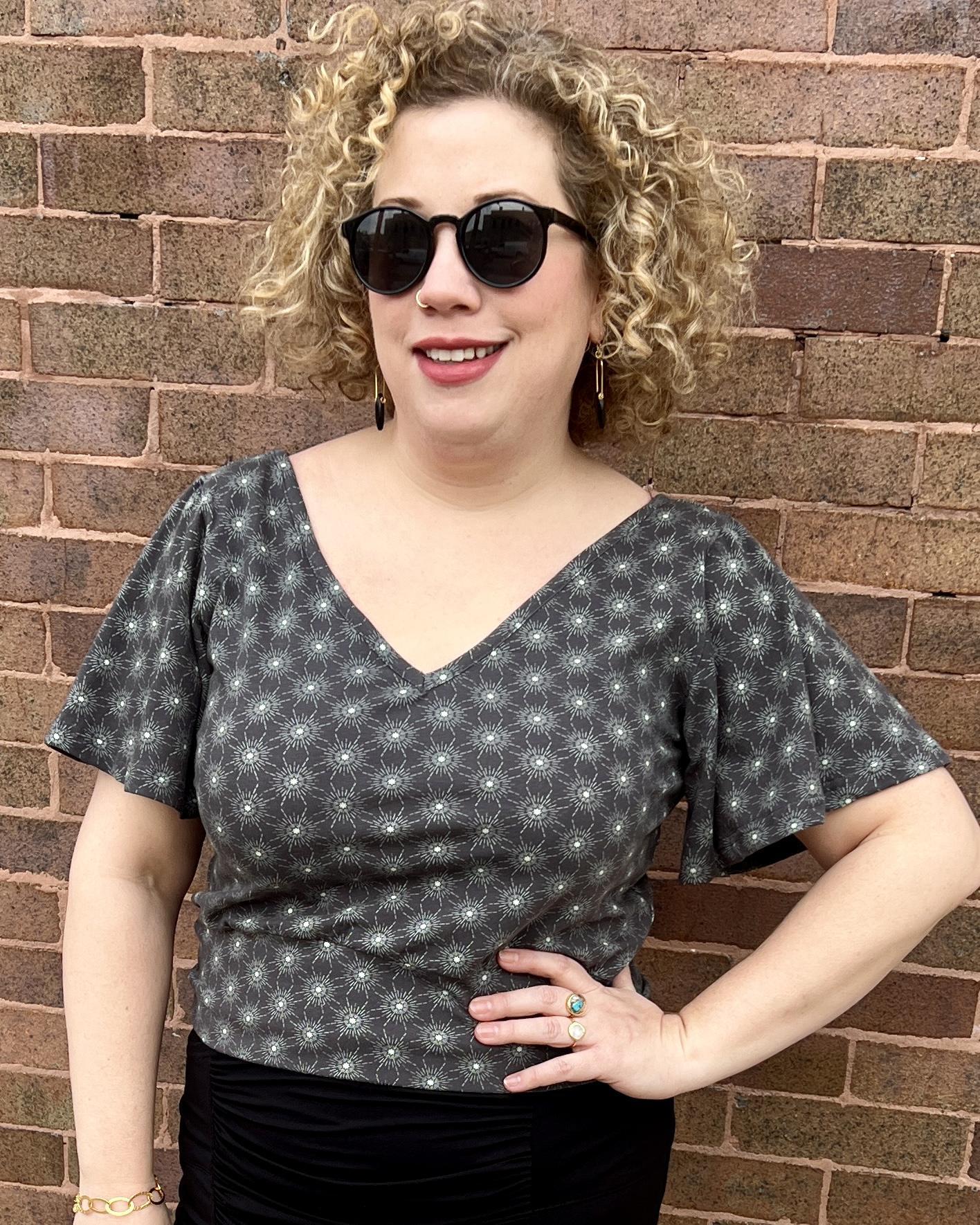 Squasht Bell Sleeve Ballet Top in Gray Starburst Print