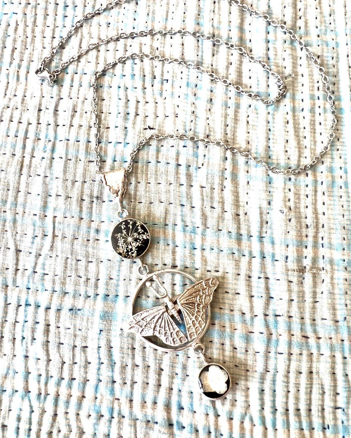 Pajaro Negro Butterfly and Floral Necklace in a Wax Sealed Box