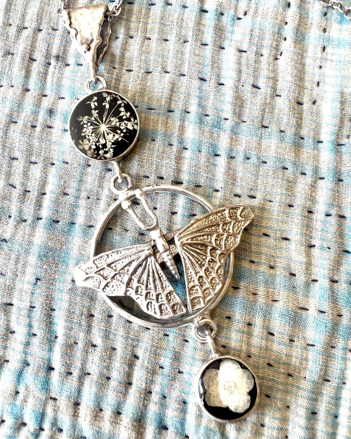 Pajaro Negro Butterfly and Floral Necklace in a Wax Sealed Box