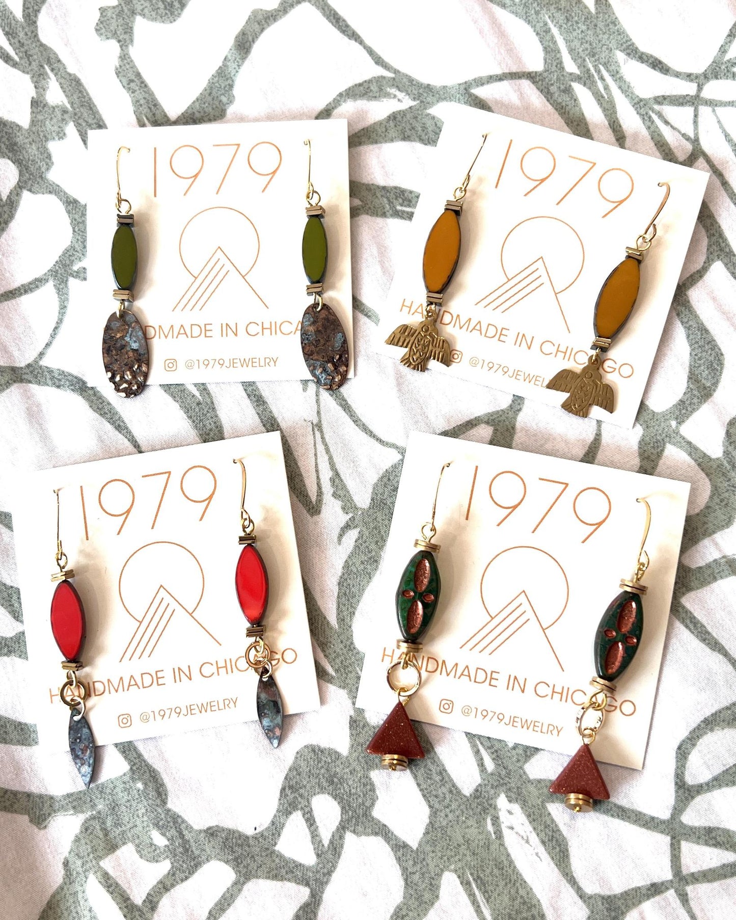 1979 Jewelry Brass Earrings Rust Ovals with Brass Thunderbirds