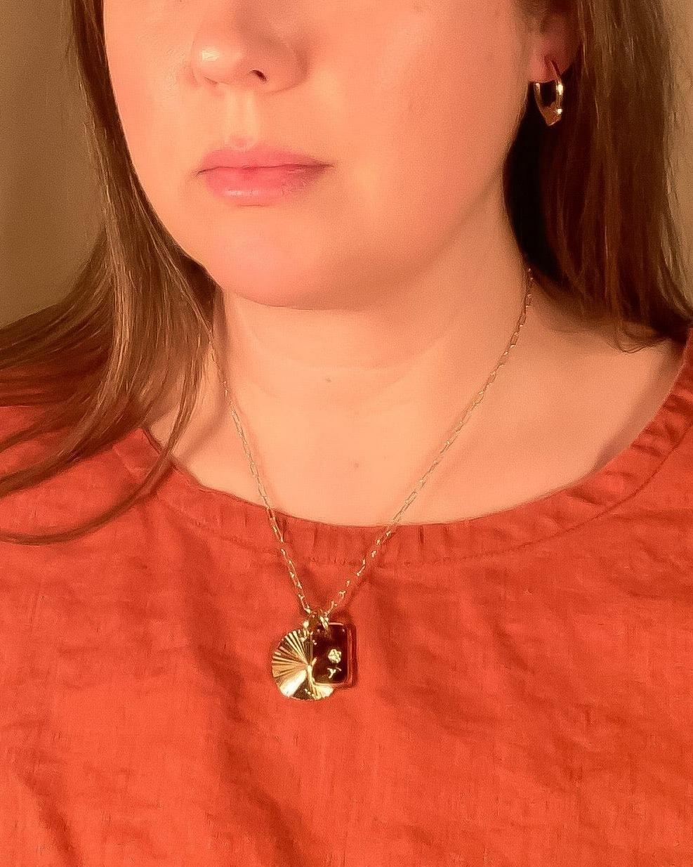 Michelle Starbuck Tortoise Glass & Sunburst Charm Necklace
