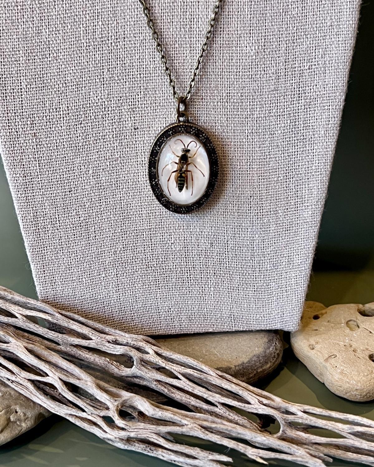 Pajaro Negro Hornet Oval Pendant Necklace
