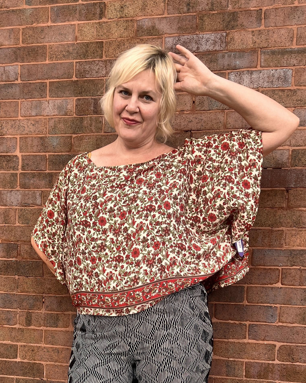 Indie Ella Tessa Flowy Silk Top in Cream with Red and Green Floral Vines Print