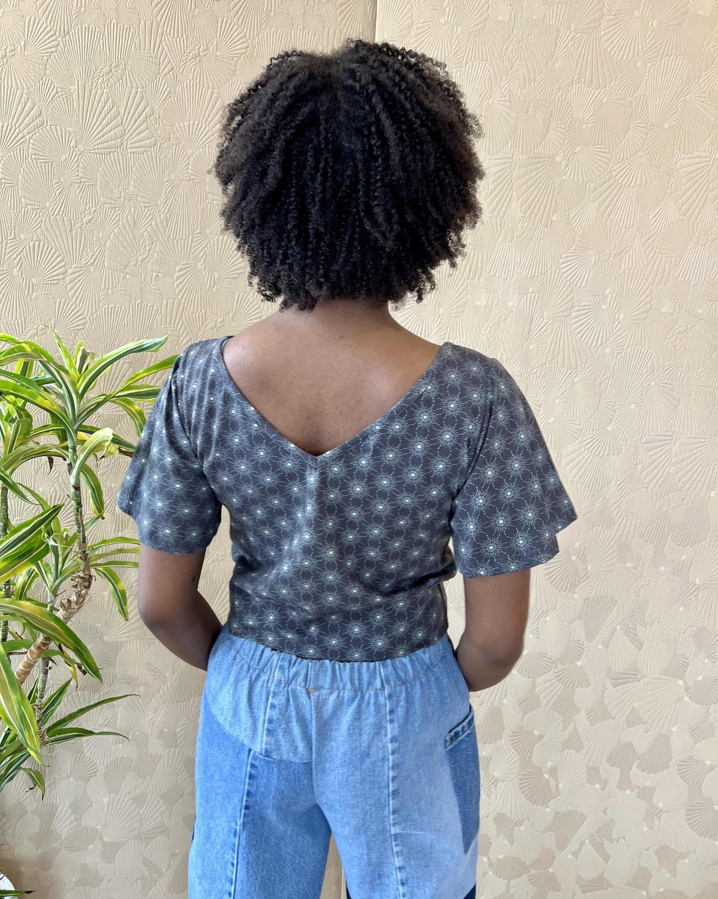 Squasht Bell Sleeve Ballet Top in Gray Starburst Print